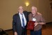 Dr. Jeremy Horne, Program Committee Chair, receives a plaque of appreciation of the Plenary Keynote Address he delivered, from Dr. Nagib Callaos, conference General Chair.